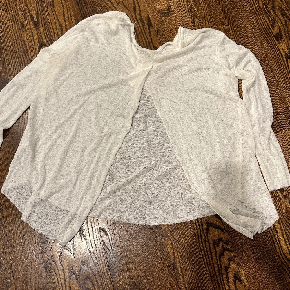 Jolie sheer ivory top with open back slit